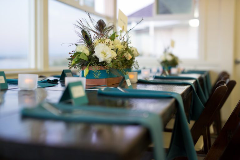 Candlelit table with decorative floral arrangement