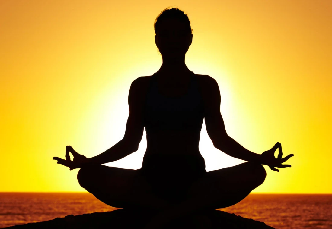 Yoga pose during sunset